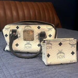 Authentic vintage MCM mini satchel with matching coin purse. Super cute.